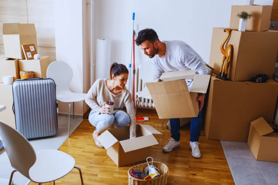 Young couple moving out of Hutto, TX apartment