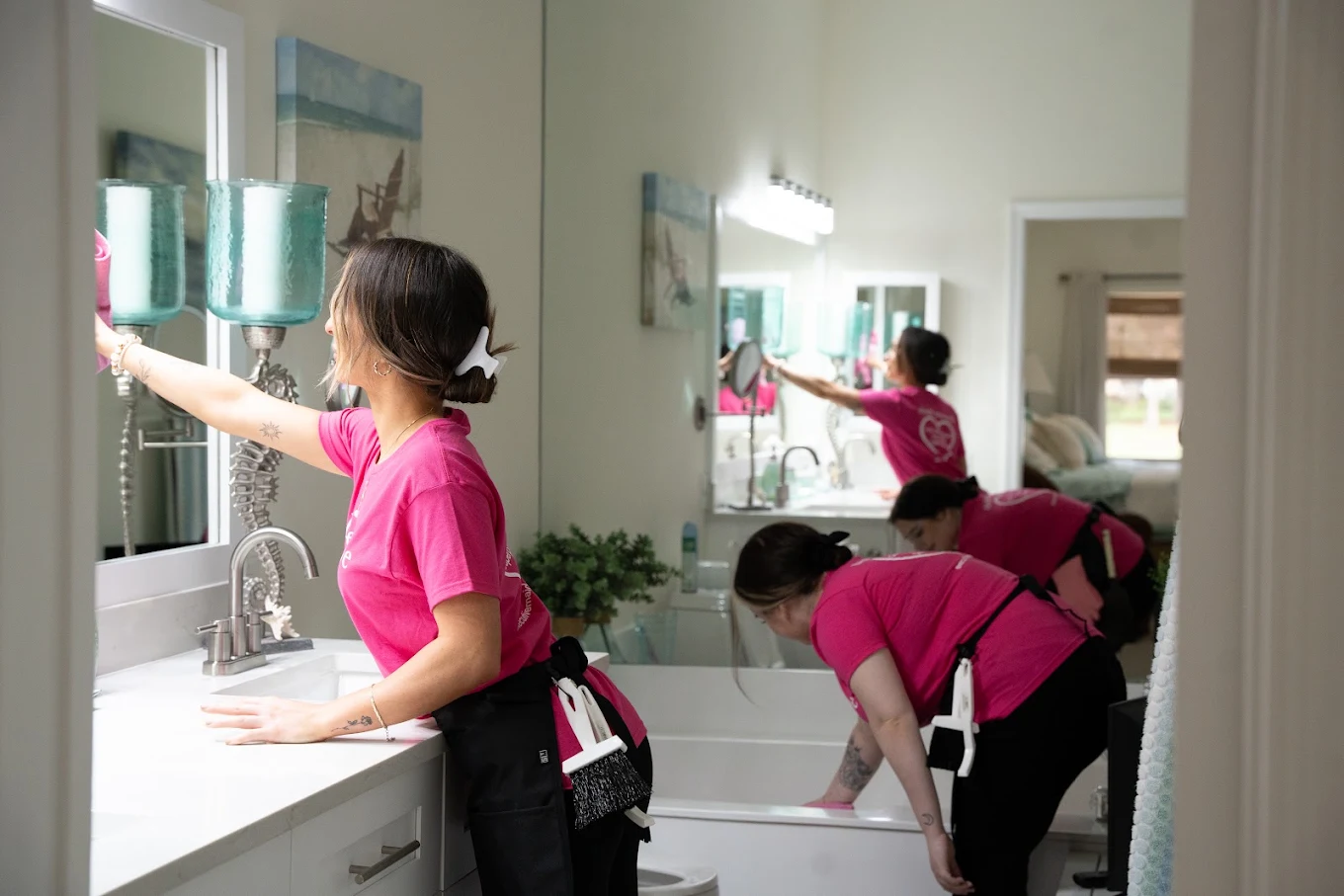 Two maids cleaning bathroom in Wellington, FL