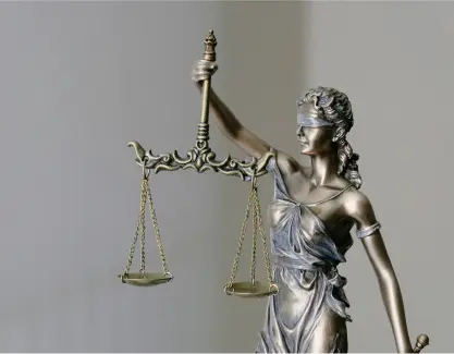 Scales of justice representing legal services in Smithfield and Clinton NC