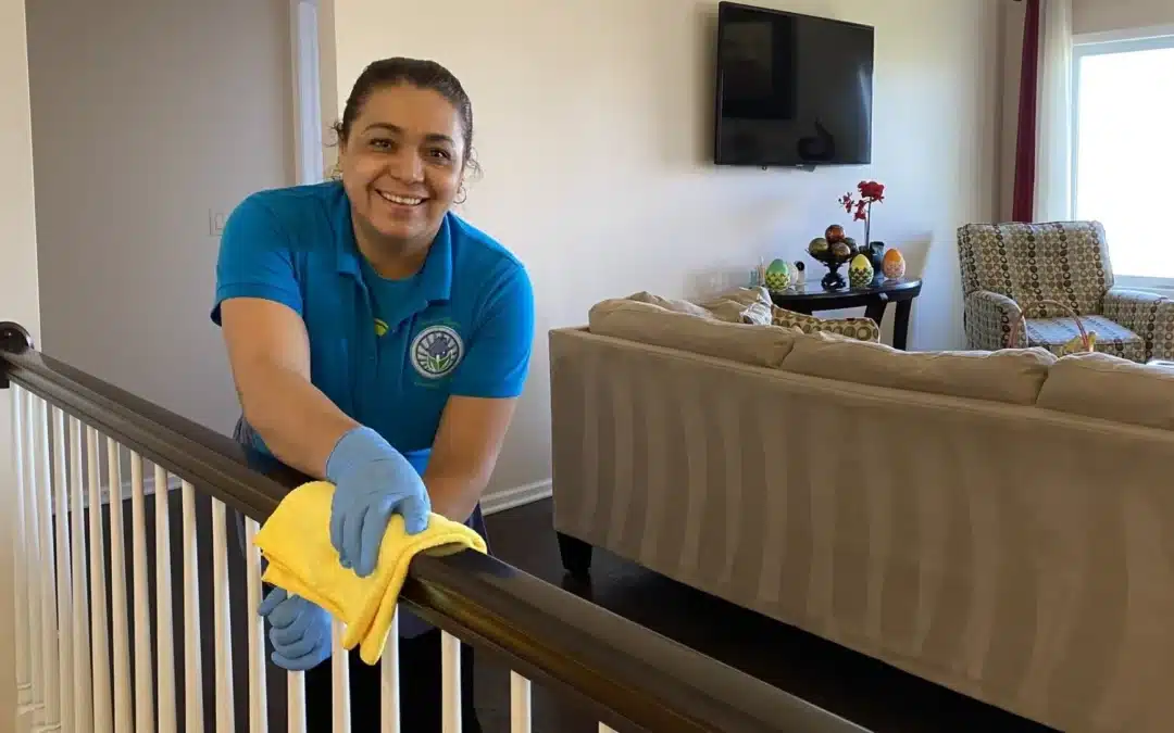 Touch of Europe employee cleaning railing