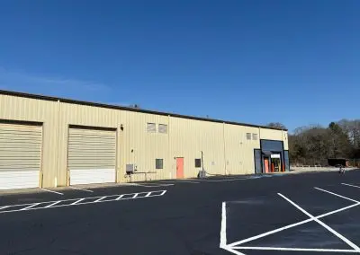 Line-striped parking lot at a commercial warehouse