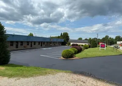 Freshly paved office parking lot with new line striping