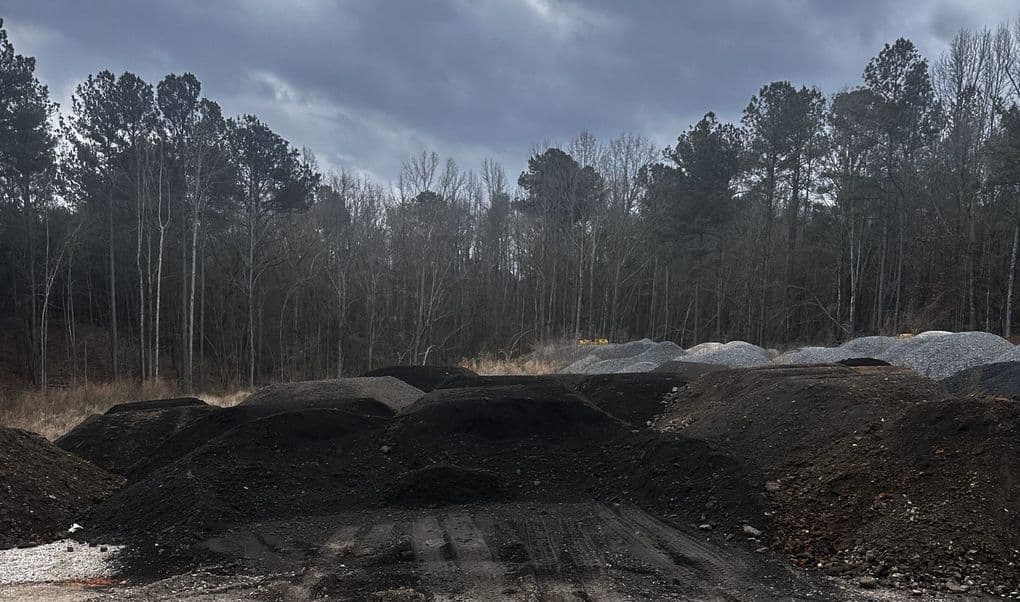 Piles of Asphalt millings available by the truckload.