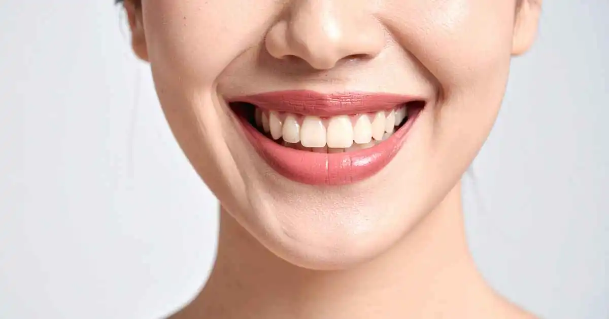 dentures-vs-partials-matthews-nc-guide-seniors-caregivers Patient with dentures at family dentist in Matthews NC.