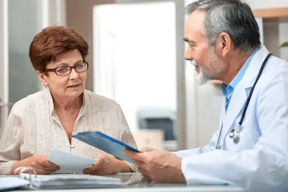 pain managment specialist consulting with patient pain managment specialist consulting with patient