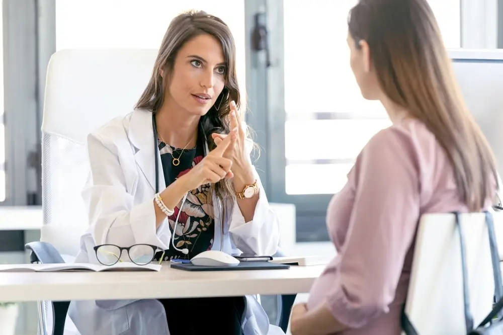 ortho doctor consulting with patient
