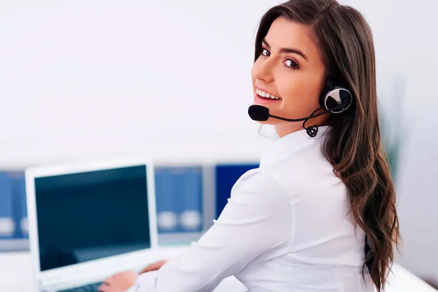 happy woman working customer service for short term loan lender