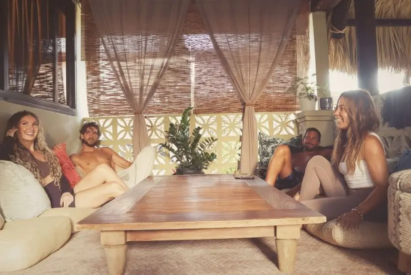 Team relaxing in the lounge area after a company retreat experience at SILA Miami, a private event venue in Miami, FL