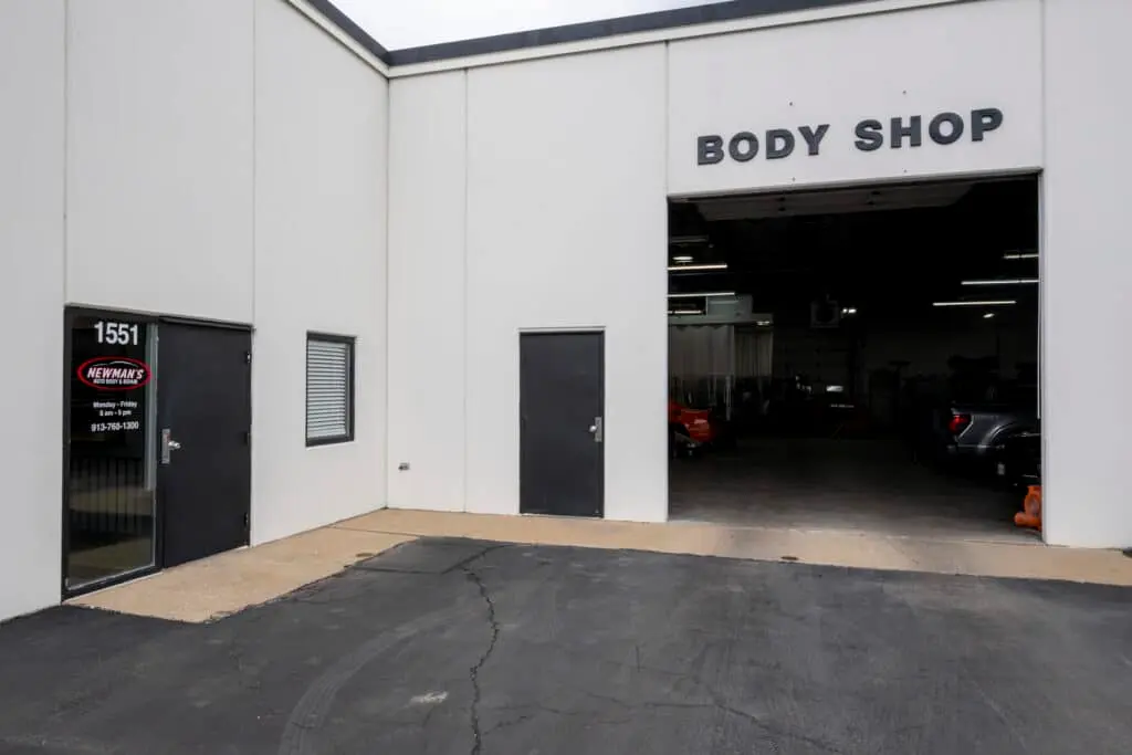 Exterior service bay entrance at Newman's Auto Body