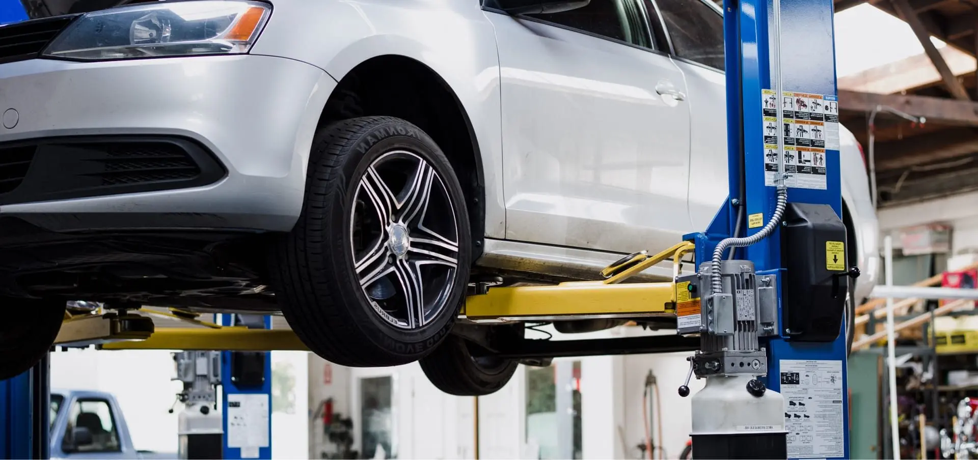 Car on Lift at Spirit One Automotive Repair Shop in West Benton Park West, St. Louis Missouri
