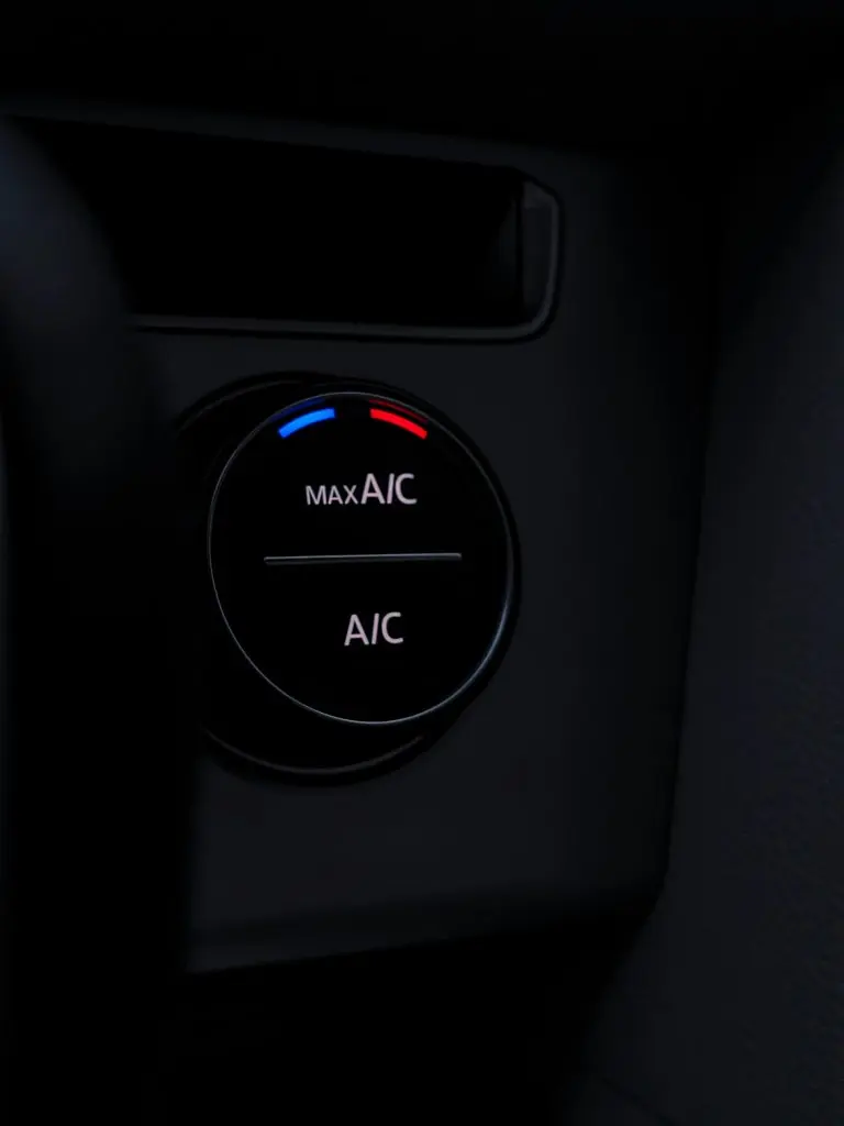 why is my ac squealing in my car