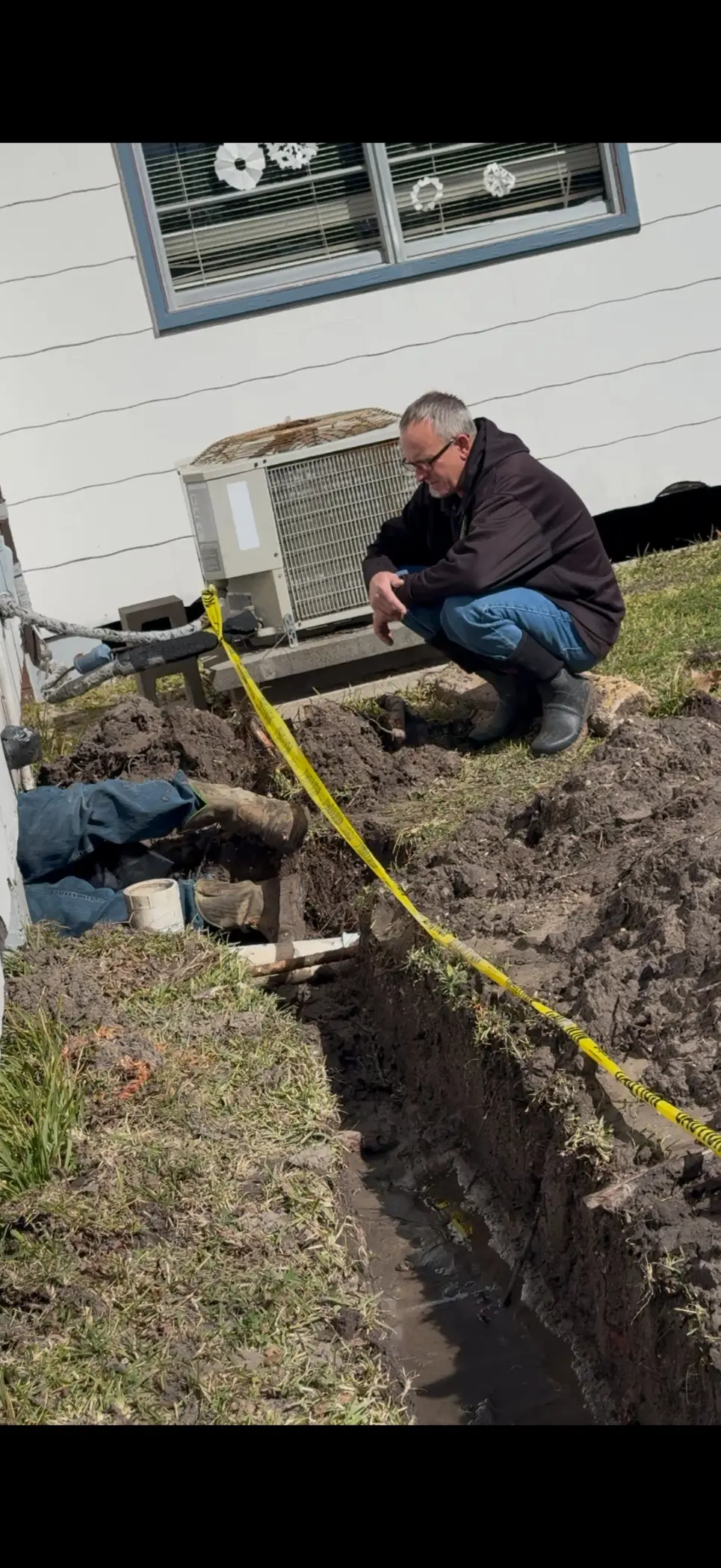 On The Way plumber inspecting sewer line excavation in Galveston County TX