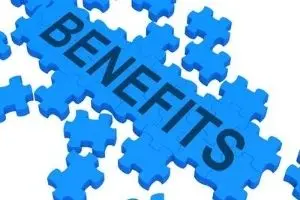 Blue puzzle pieces with the word "BENEFITS" prominently displayed, representing the advantages of installing water softeners for addressing hard water issues in plumbing systems.