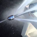 Metallic nozzle on a pipe spraying water, showcasing plumbing solutions for effective drain cleaning by B&L Plumbing.