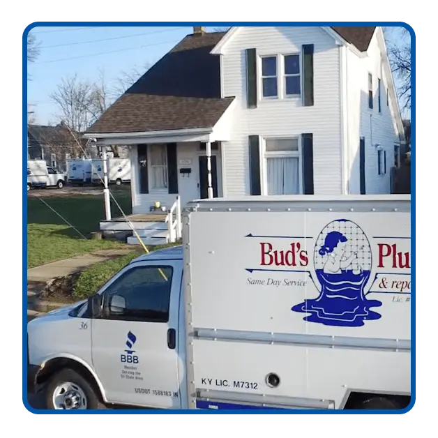 Bud&rsquo;s Plumbing & Repair Service Truck Outside of Residential Property