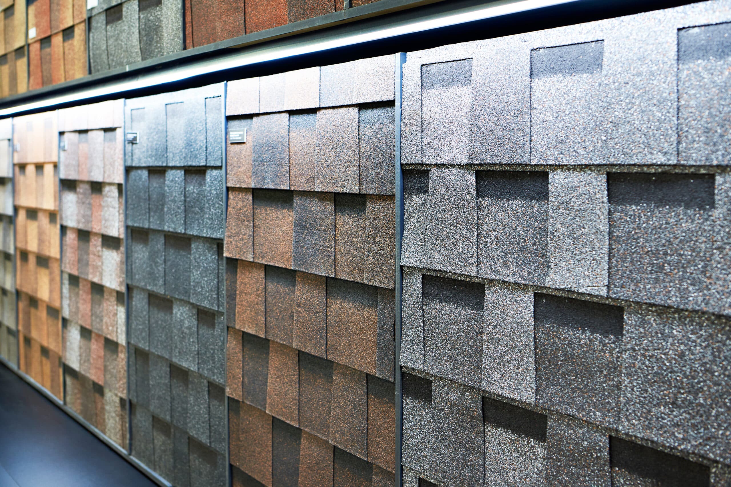 Laminate roof tiles for decorative finishing on display