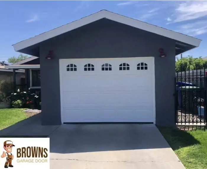 garage-door-installation Newly installed modern garage door enhancing the home's curb appeal and security.