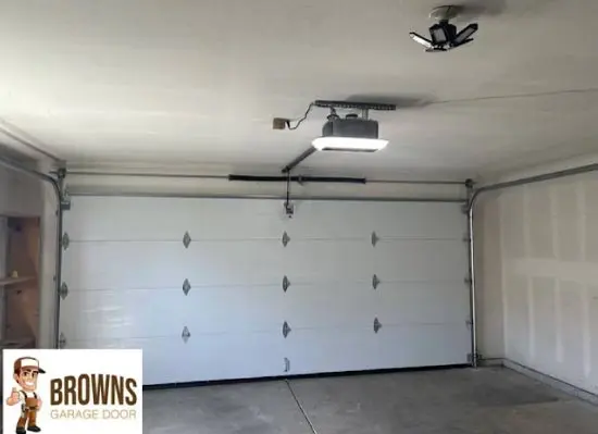 garage-door-spring Repaired garage door spring mechanism ensuring smooth, quiet, and reliable door movement.