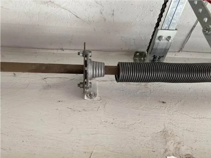 visalia-garage-door-spring-repair fixed garage door coil spring after emergency garage repair in visalia ca