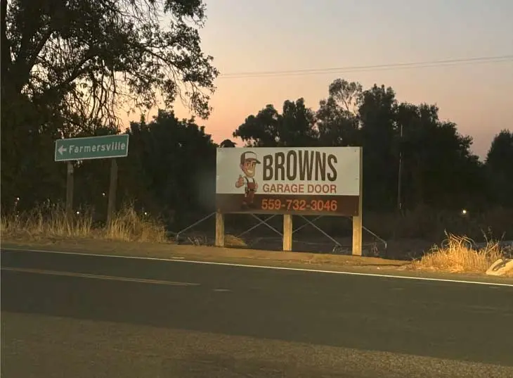 garage-door-service-visalia-sign branded sign of browns garage door repair in visalia highway