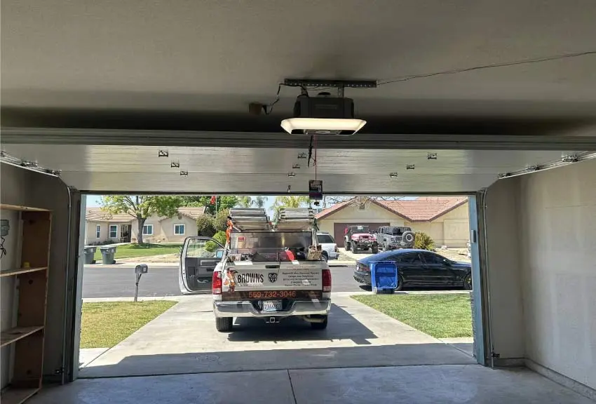 Newly installed residential garage door enhancing home curb appeal and security in visalia ca