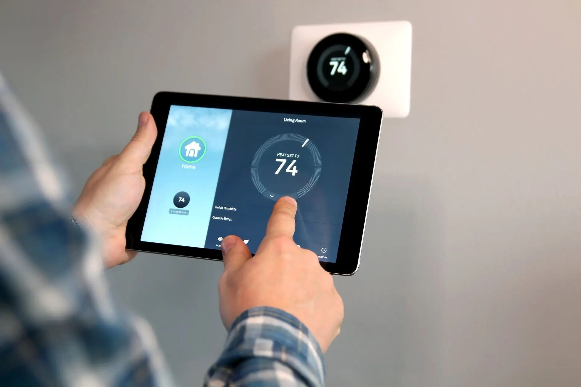 Adjusting a smart thermostat with a tablet application
