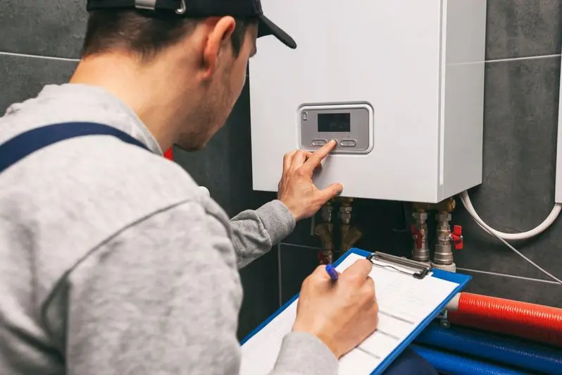Plumber repairing a water heater