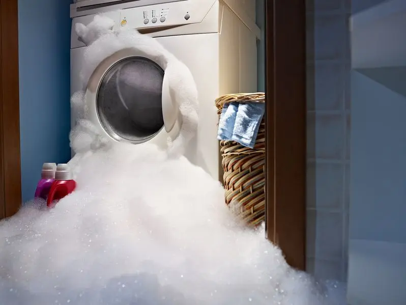 soap coming out from broken washing machine