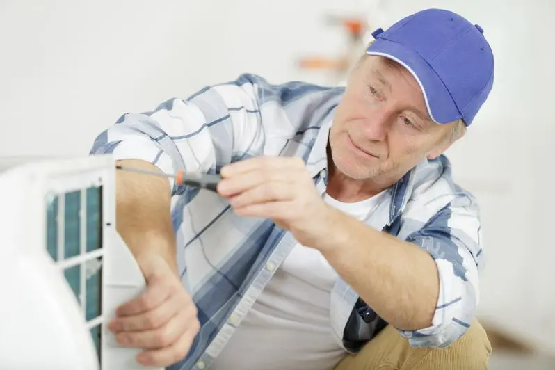 a mature air conditioning technician