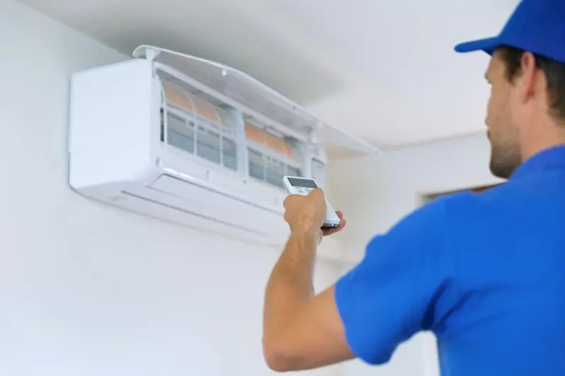 HVAC professional installing a mini split AC 