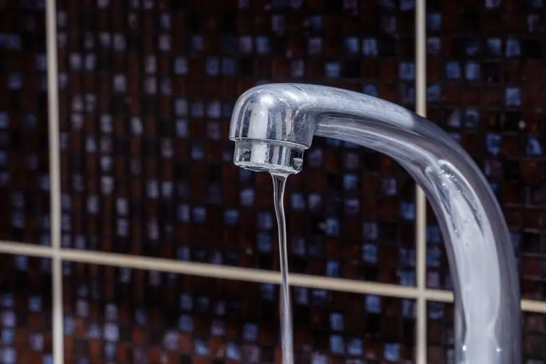 Bathroom faucet with pouring water