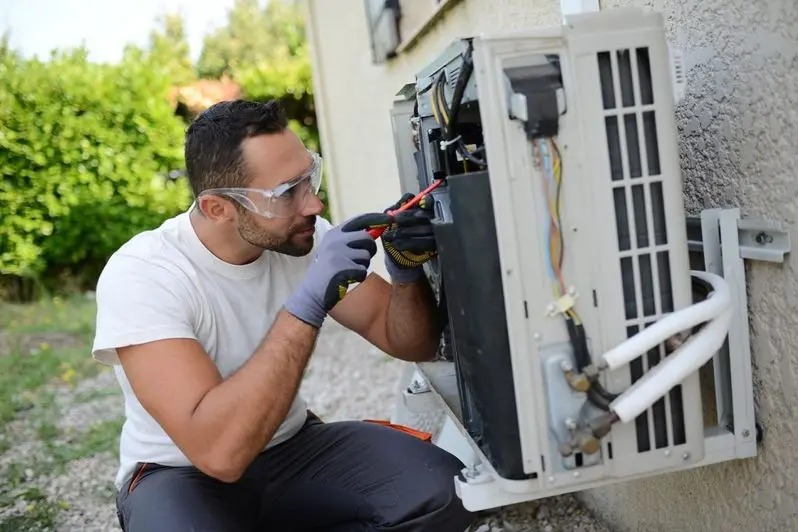 electrician installing an air conditioning in a client house