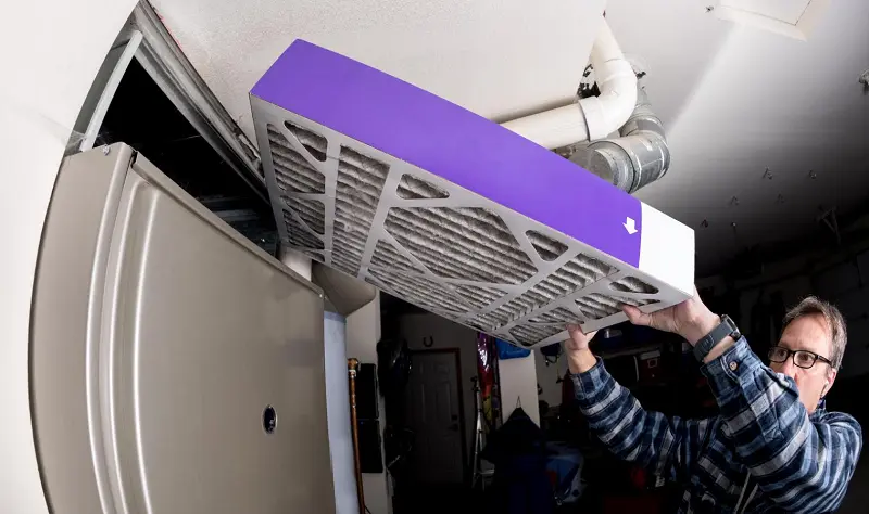 Large sized furnace filter loaded into the appropriate place