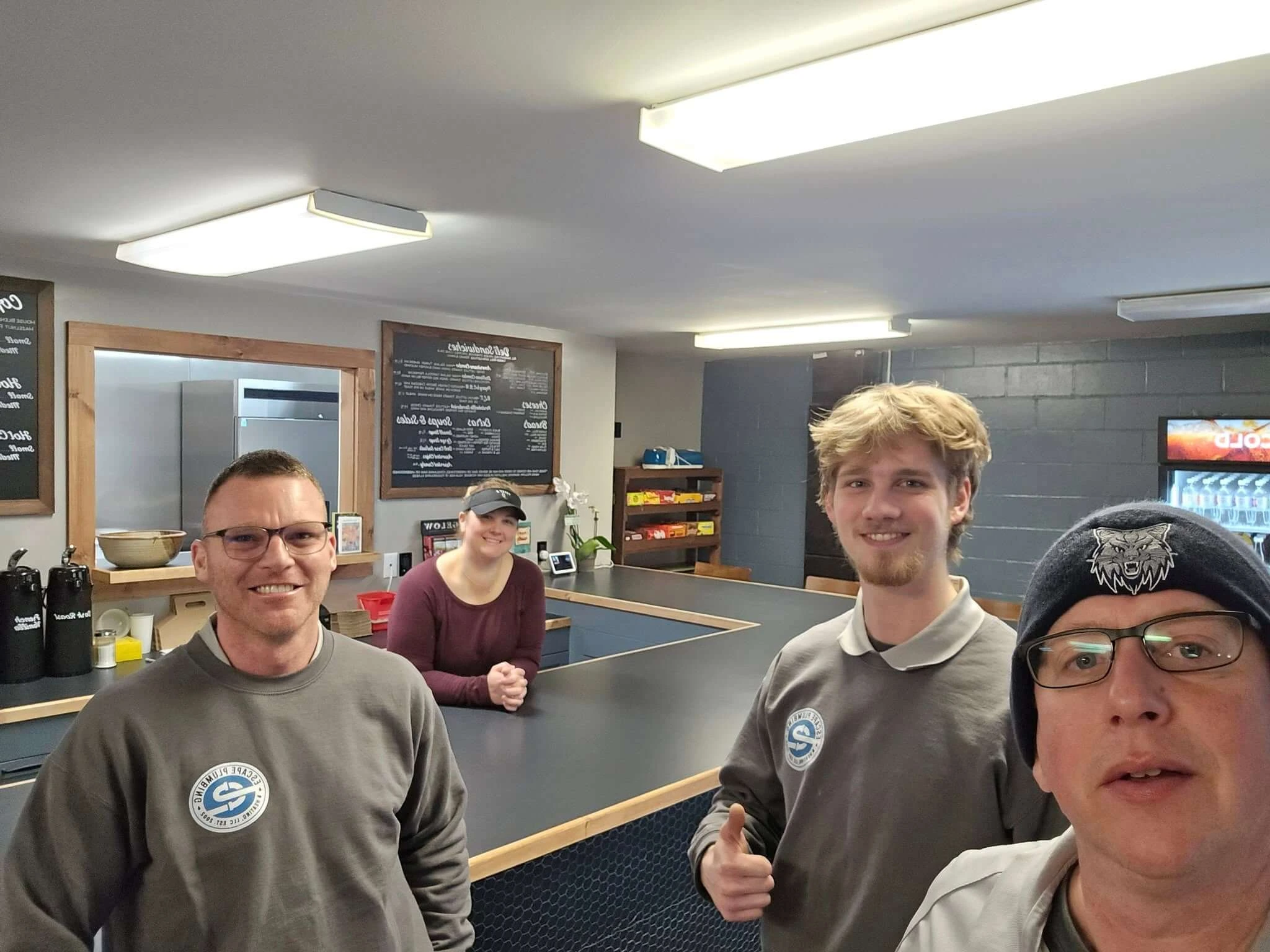 Employees at Escape Plumbing & Heating