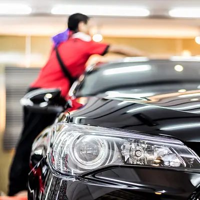 Polishing and Waxing Exterior of a Luxury Car