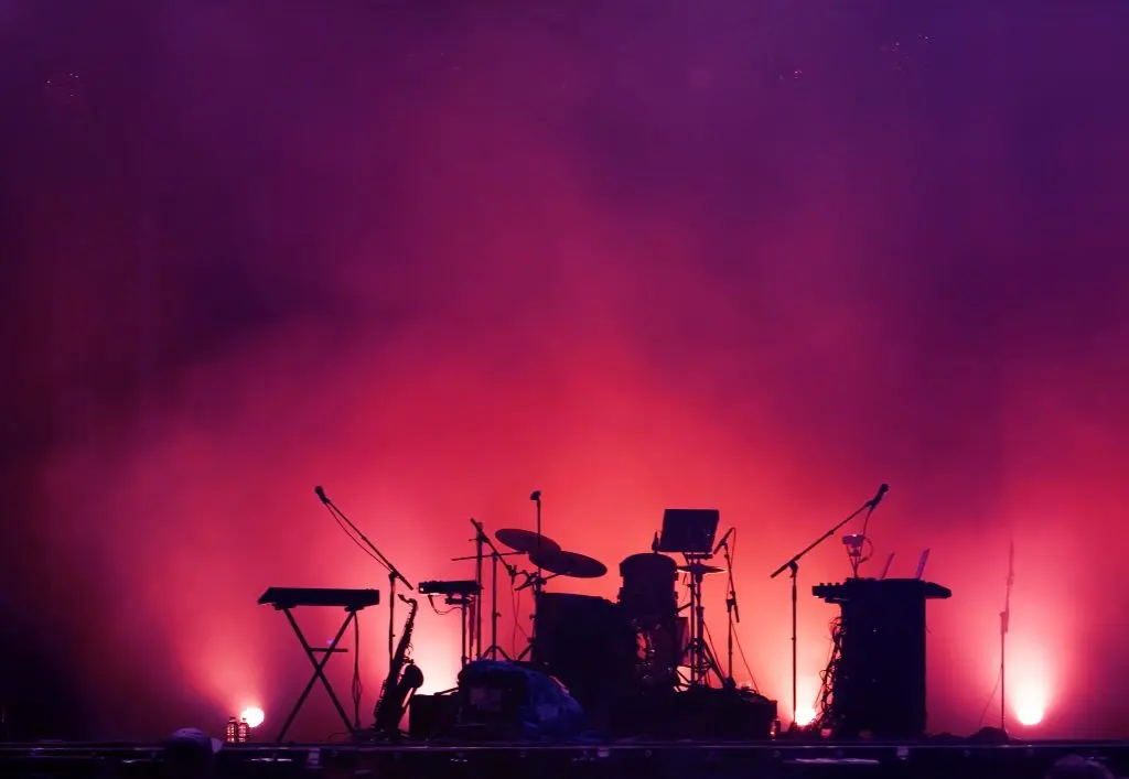 bank of america fall for greenville concert stage on rock festival, music instruments silhouettes, colorful background with copy space