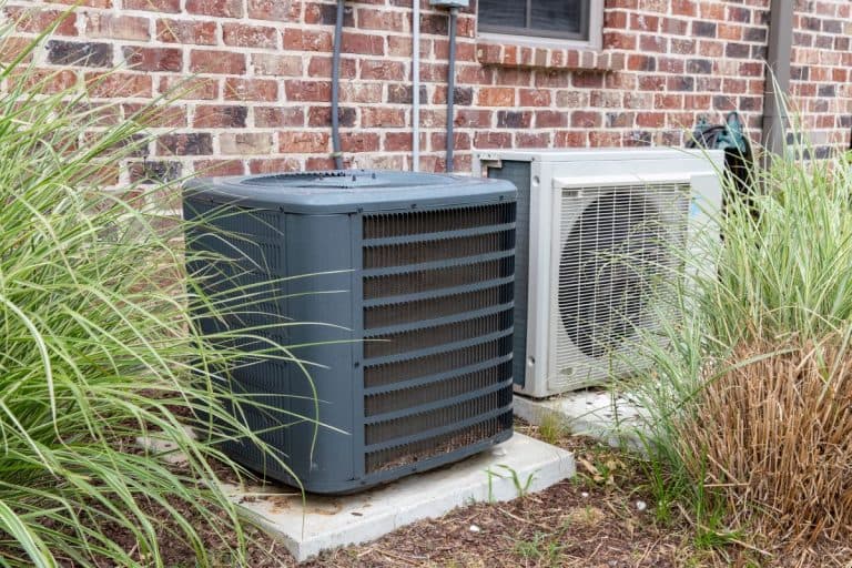 heat pump defrost cycle grey unit outdoors