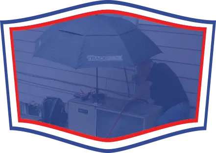 technician checking an ac box