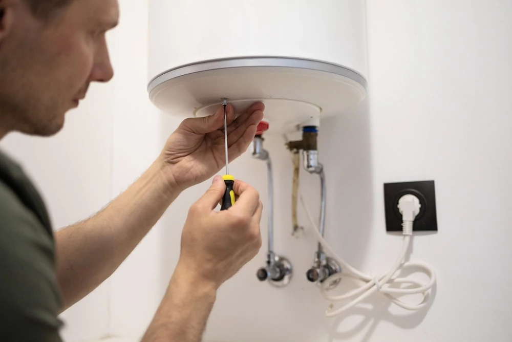 Professional installing water heater