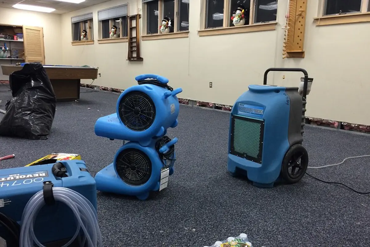 a blue machine in a room