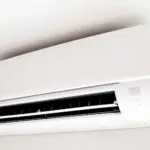 Ductless mini-split air conditioning unit mounted on a ceiling, highlighting efficient air quality control for homes in DeBary, FL.