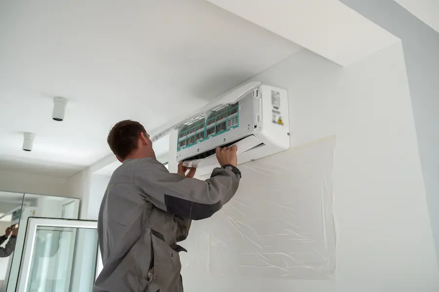 Homeowner checking his AC