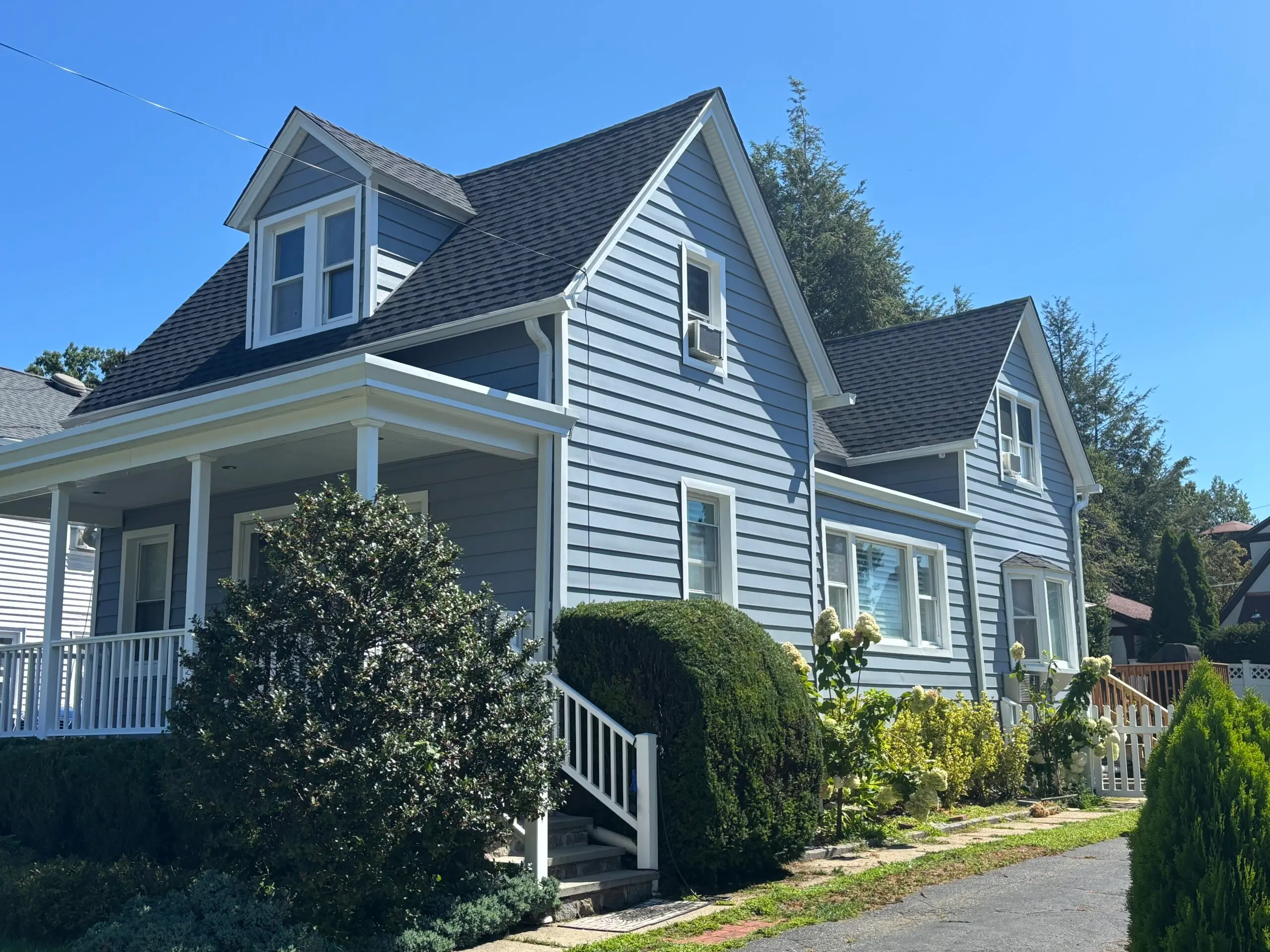blue siding grey shingles