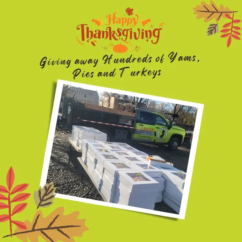 Happy Thanksgiving banner with text about giving away hundreds of yams, pies, and turkeys, showcasing boxes on a table and a truck in the background, reflecting Jersey Trenchless LLC's community involvement in their annual turkey giveaway.