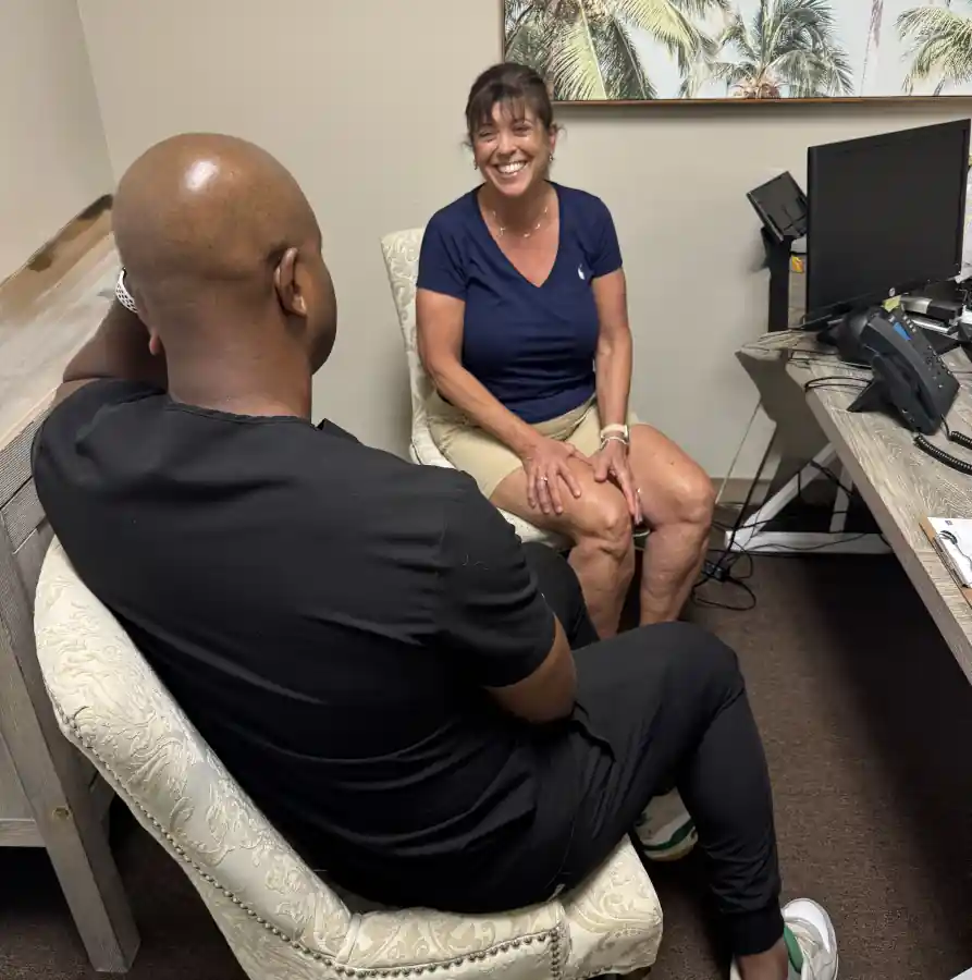 Person with knee pain before seeking orthobiologic therapy Serving Treasure Coast