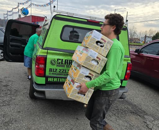 Technician carrying boxes