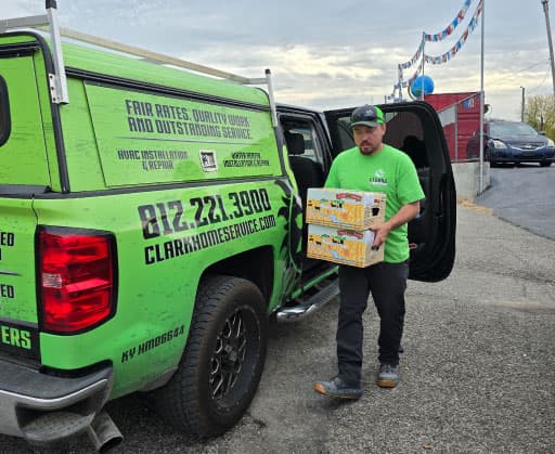 Technician carrying supplies