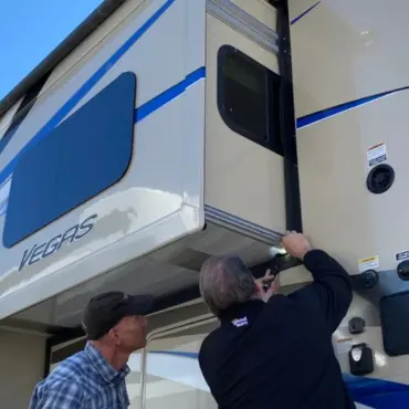 RV slide-out and window frame repair at service center
