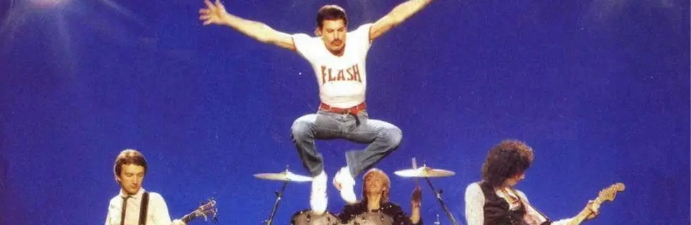 Freddie Mercury performing energetically on stage with a band, emphasizing the theme of resilience and overcoming challenges, relevant to hard water issues in households.