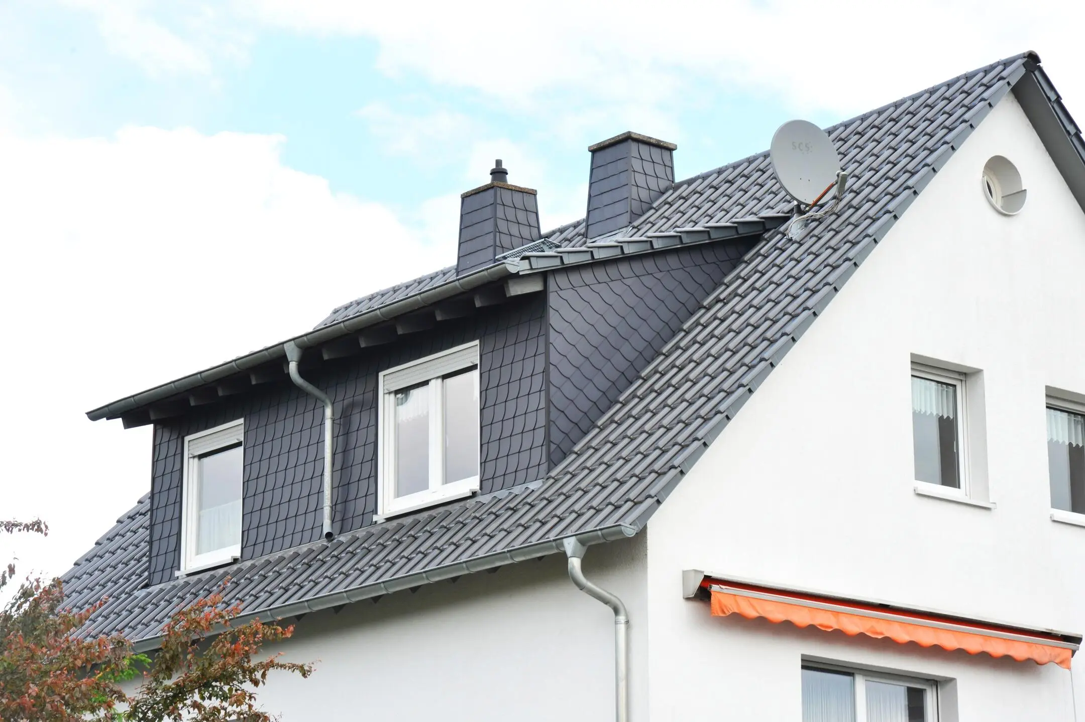 types of dormers-dormer on metal shingle roof